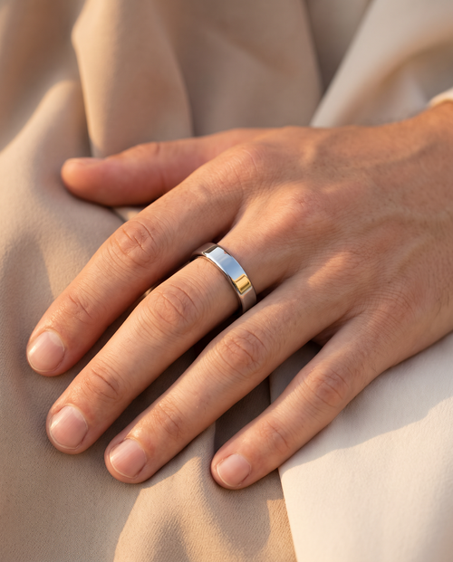 Mudrika Ring in silver, worn by a male hand model